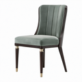 Silla de comedor de terciopelo verde y madera con detalles dorados 85x50x52 cm
