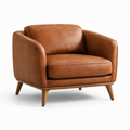 Sillón de cuero marrón con patas de madera