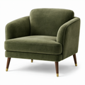 Sillón de terciopelo verde con patas de madera y acabado de latón